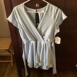 Woman’s romper, new with tags, never worn! Altar’d State brand!